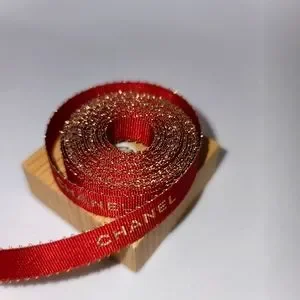 CHANEL | Accessories | Chanel Red And Gold Ribbon Feet  display picture 1